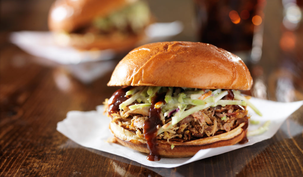 pulled pork barbecue sandwiches shot in panorama format.