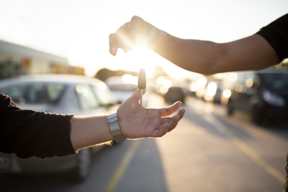 Dealership passing keys to client