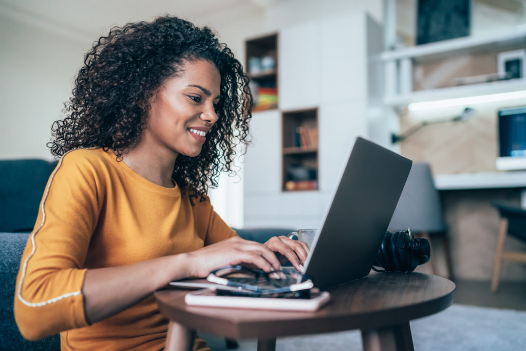 Young woman working on her laptop