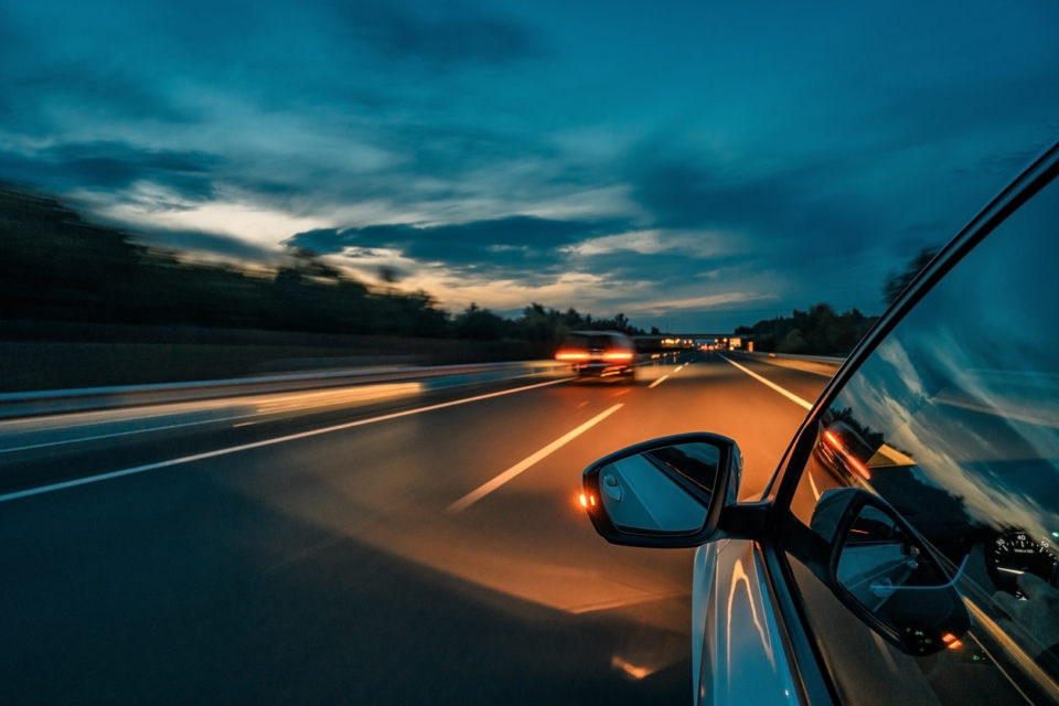 Driving on the road at dusk